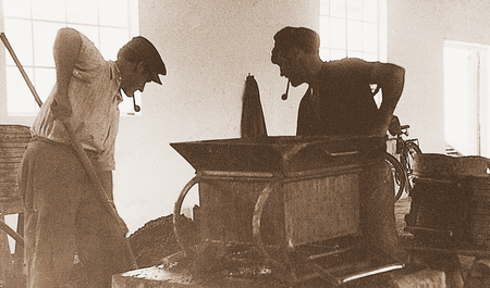 Employees at a vibratory plate