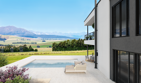 Schiedel PERMETER v černé barvě na fasádě domu